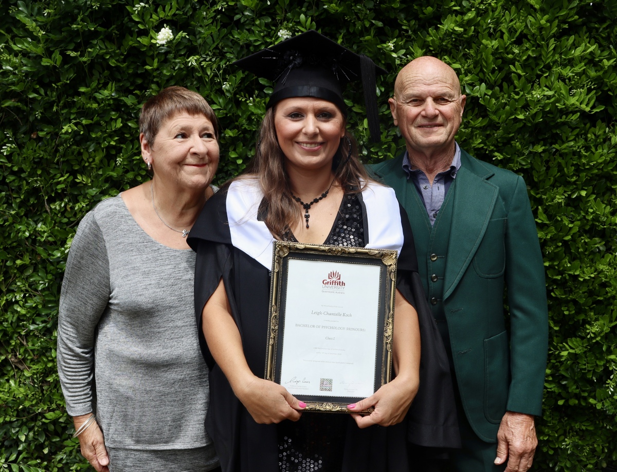 LC_with_her_parents_graduation